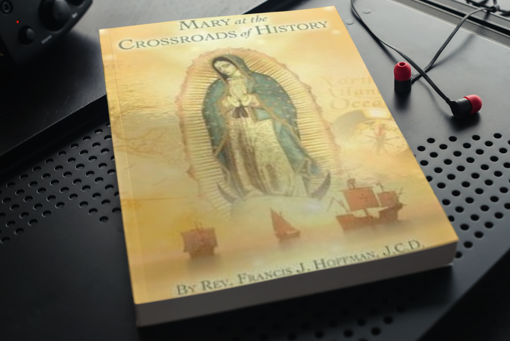 Book cover of Mary at the Crossroads of History sitting on a metal desk